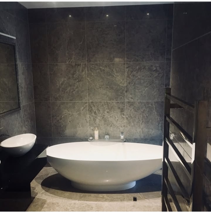 Intricate decorative mosaic tile feature wall with custom pattern design