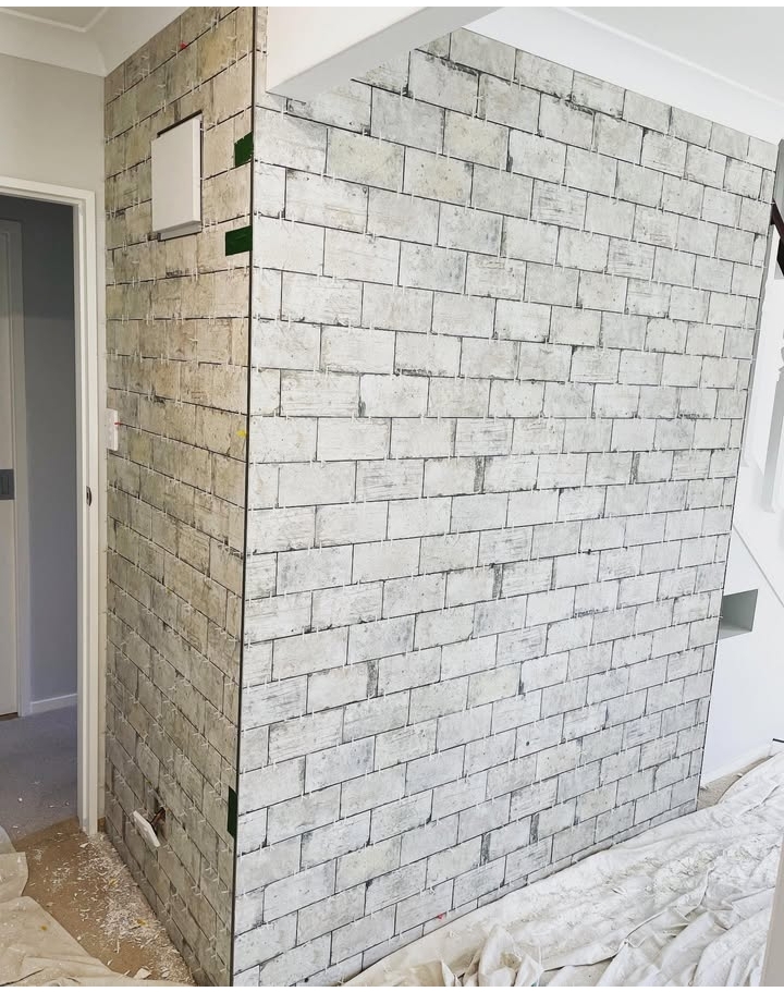 Custom outdoor patio featuring weather-resistant tile installation